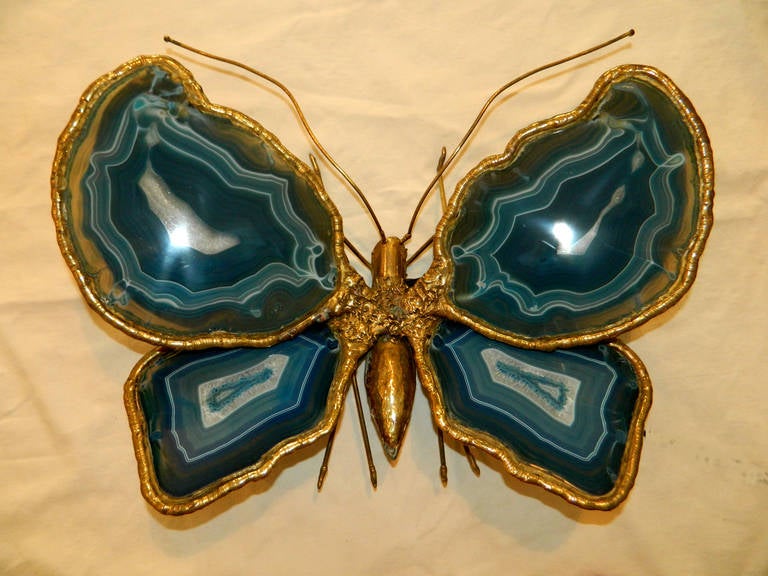 Large sconce by Duval Brasseur featuring a butterfly.
The four wings are made with agate stone, use four bulbs.
Give a very smooth and elegant light.
US wired and in working condition.
Have a look on our impressive collection of French and
