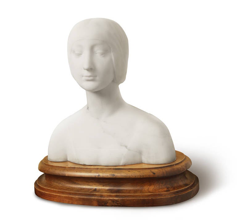 Replica made by Pietro Bazzanti Marble Studio of the bust of Isabella of Aragon, wife of Gian Galeazzo Sforza, Duke of Milan, originally carved by Francesco Laurana around 1483-1498. The original is on display at Louvre museum in Paris. The wooden