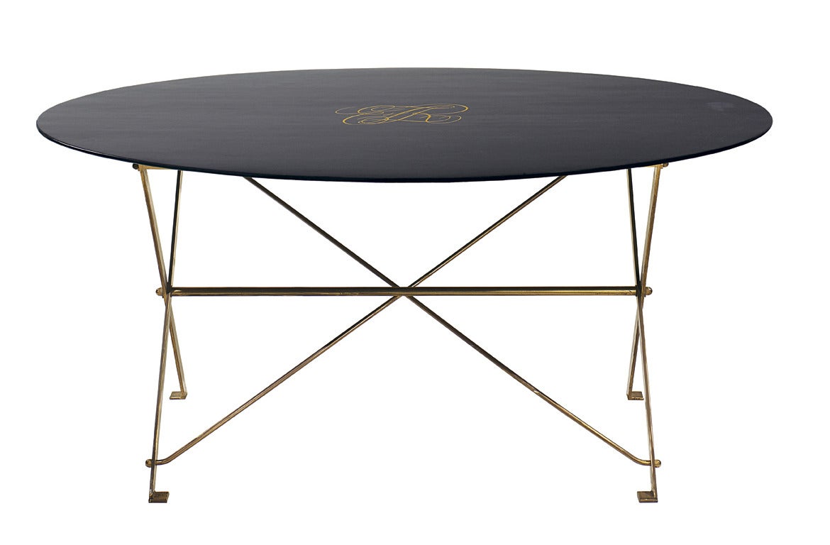 Table T3 by Luigi Caccia Dominioni
Italy, 1948
Produced by Azucena
Brass base, lacquered wood top, dark purple
This piece was produced upon request for a private house
Initials of the client are written in the middle of the table top