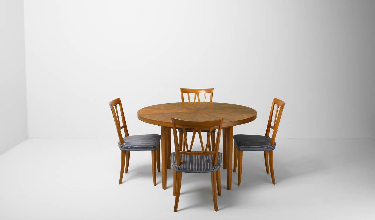 Dining set by Carl Malmsten,
Sweden, first designed 1937, probably 1940’s production
8 chairs, table with 3 extra extension leafs
Made of mahogany and beech wood. Original Malmsten fabric’p90p
Chairs and table är burn stamped 