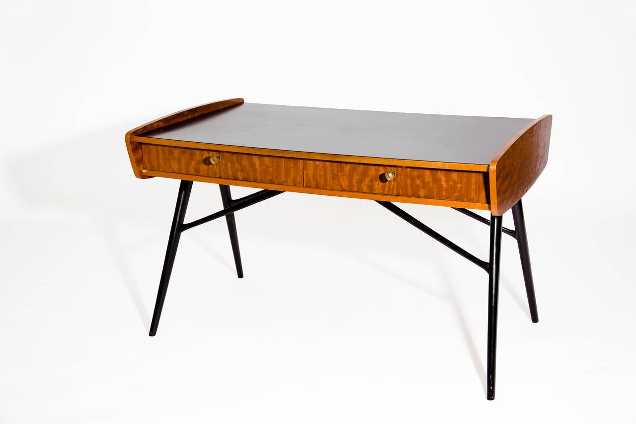 Desk and chair by Alfred Hendrickx
Belgium, 1958
desk: lacquered wood base and top, teak, two drawers
chair: : lacquered wood structure, fabric upholstery