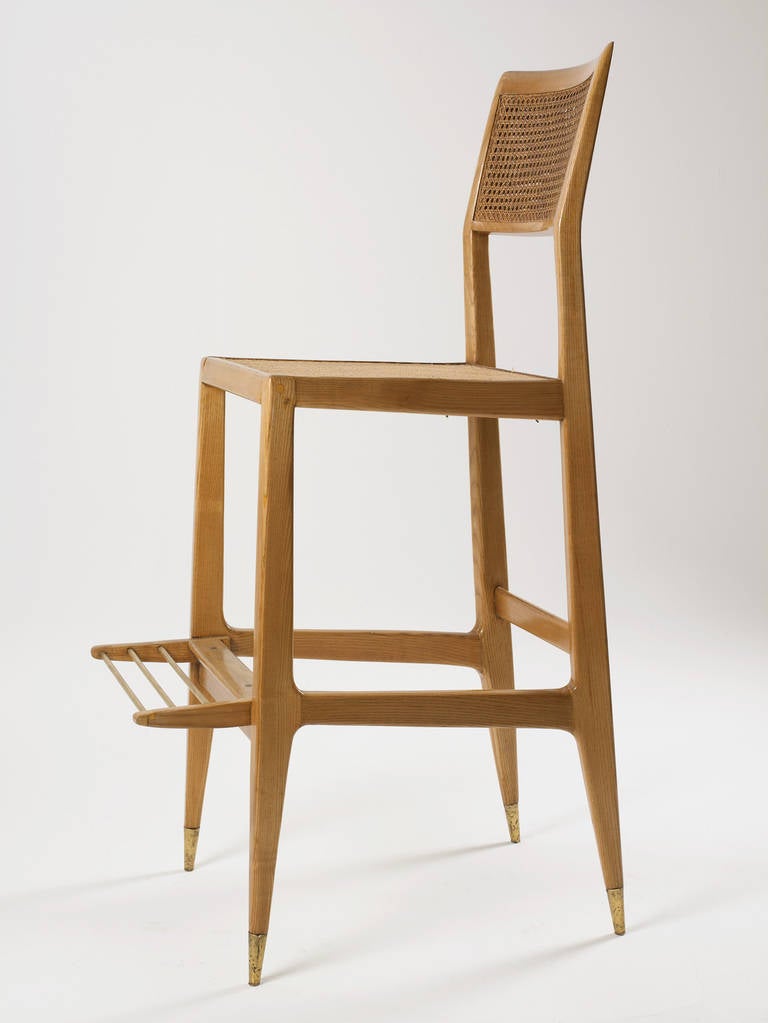 Ash frame with woven cane seat and back, brass footrest