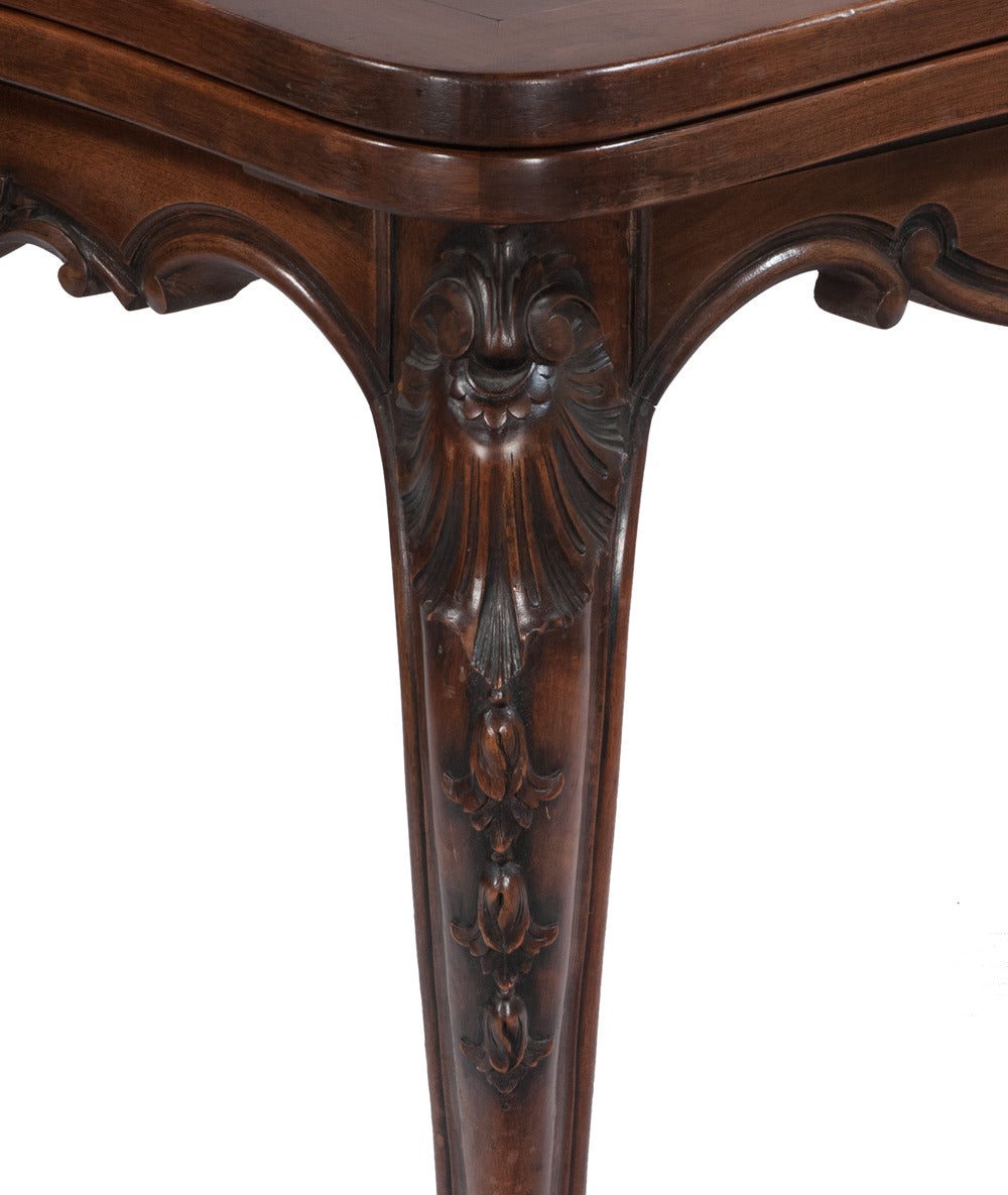 Early 20th century Louis XV-style walnut draw-leaf refractory table with parquetry top. From Leon, France. Each leaf, 30.5