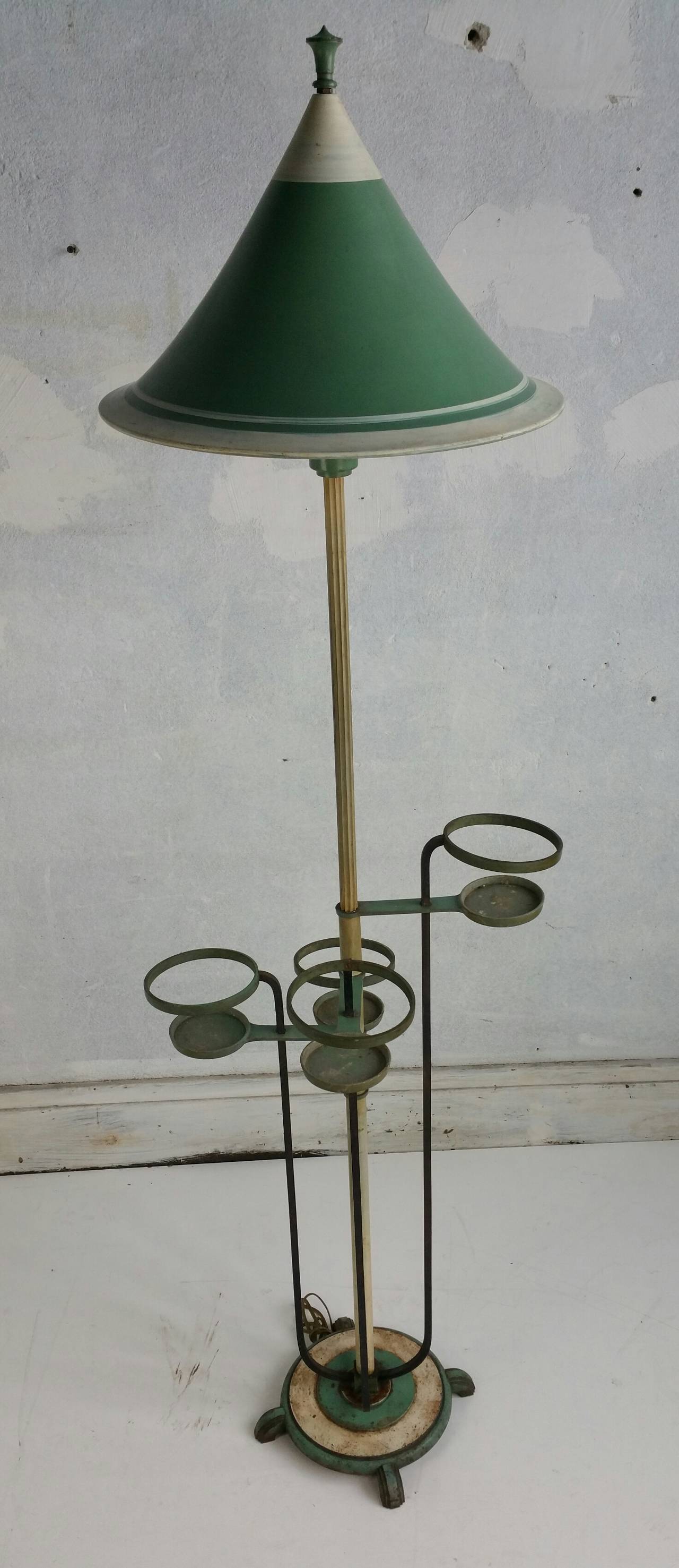 Art Deco Floor Lamp, attached, original brass, iron and aluminum plant holders. Most unusual design,Classic sky-scraper base.Fluted brass standard. Painted aluminum trumpet shade, (12' DIAMETER),Retains original patina. Amazing color and finish,