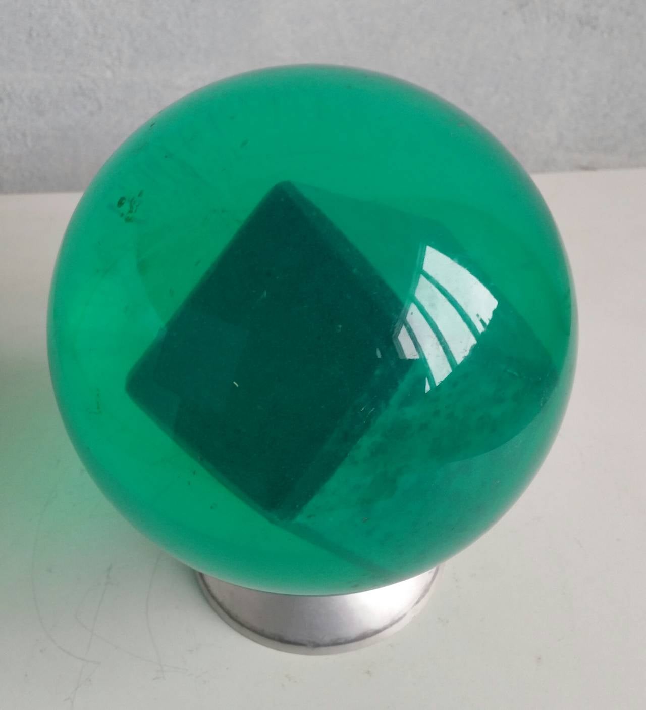 Unusual acrylic bowling ball, great little Mid-Century Modern object, finger holes never drilled, floating Styrofoam cube inside. Aluminum stand not included.