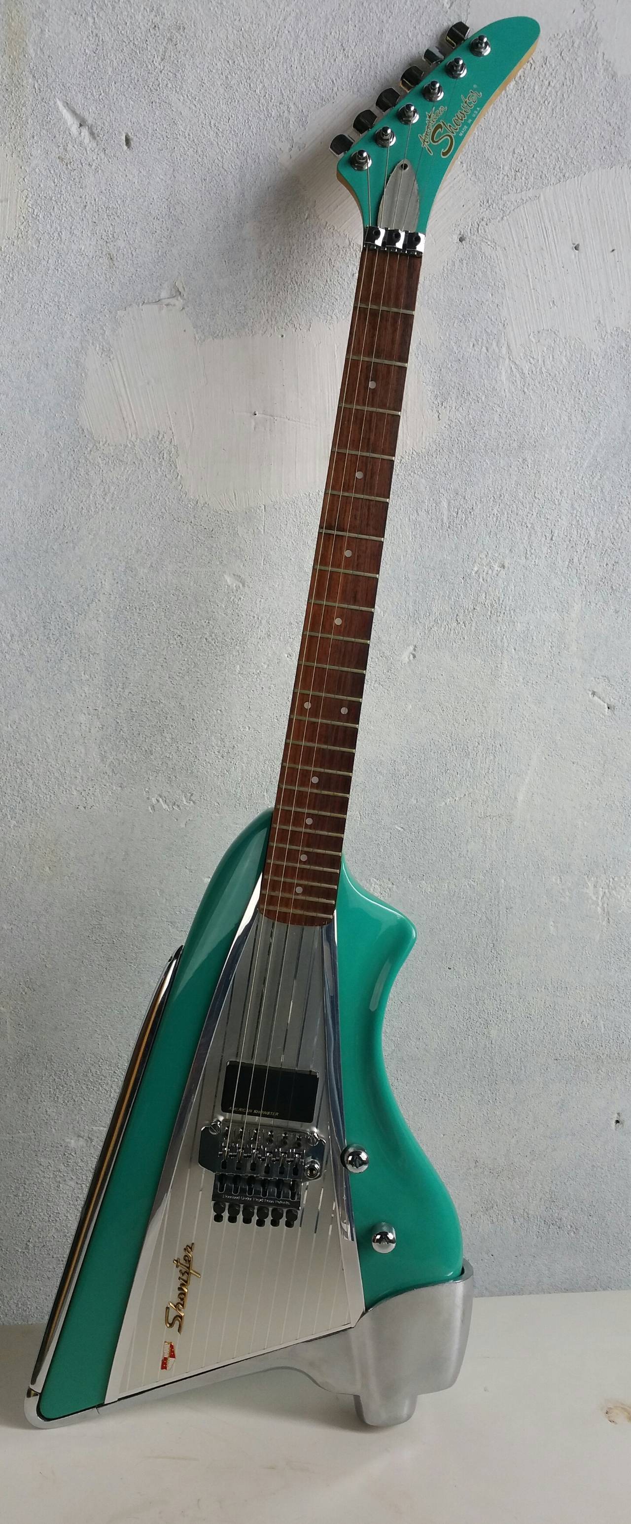 Beautiful American Showster Electric Guitar,, Model AS-57,, Amazing modernist design,,In the mid 80's Chevrolet licenced the design of the '57 Chevy tail fin to the American Showster, In 1983 the AS-57 was born offering the same color variations as
