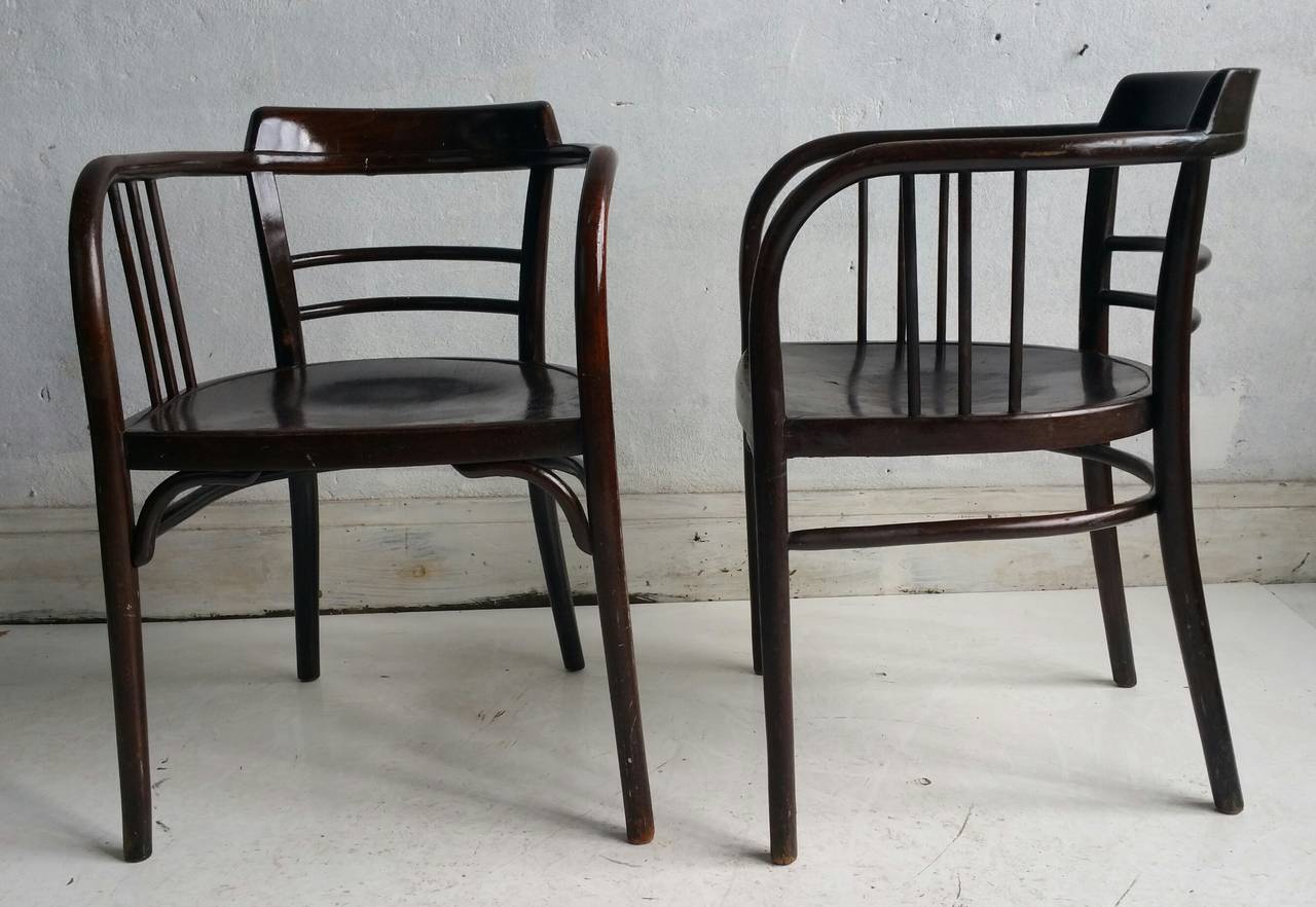 Nice Matched Pair of handsome THONET  arm chairsmanner of Otto Wagner,,Joesph Hoffmann,Extremely comfortable,, Classic Styling,,Solid bentwood,dark mahogany stain.Early 