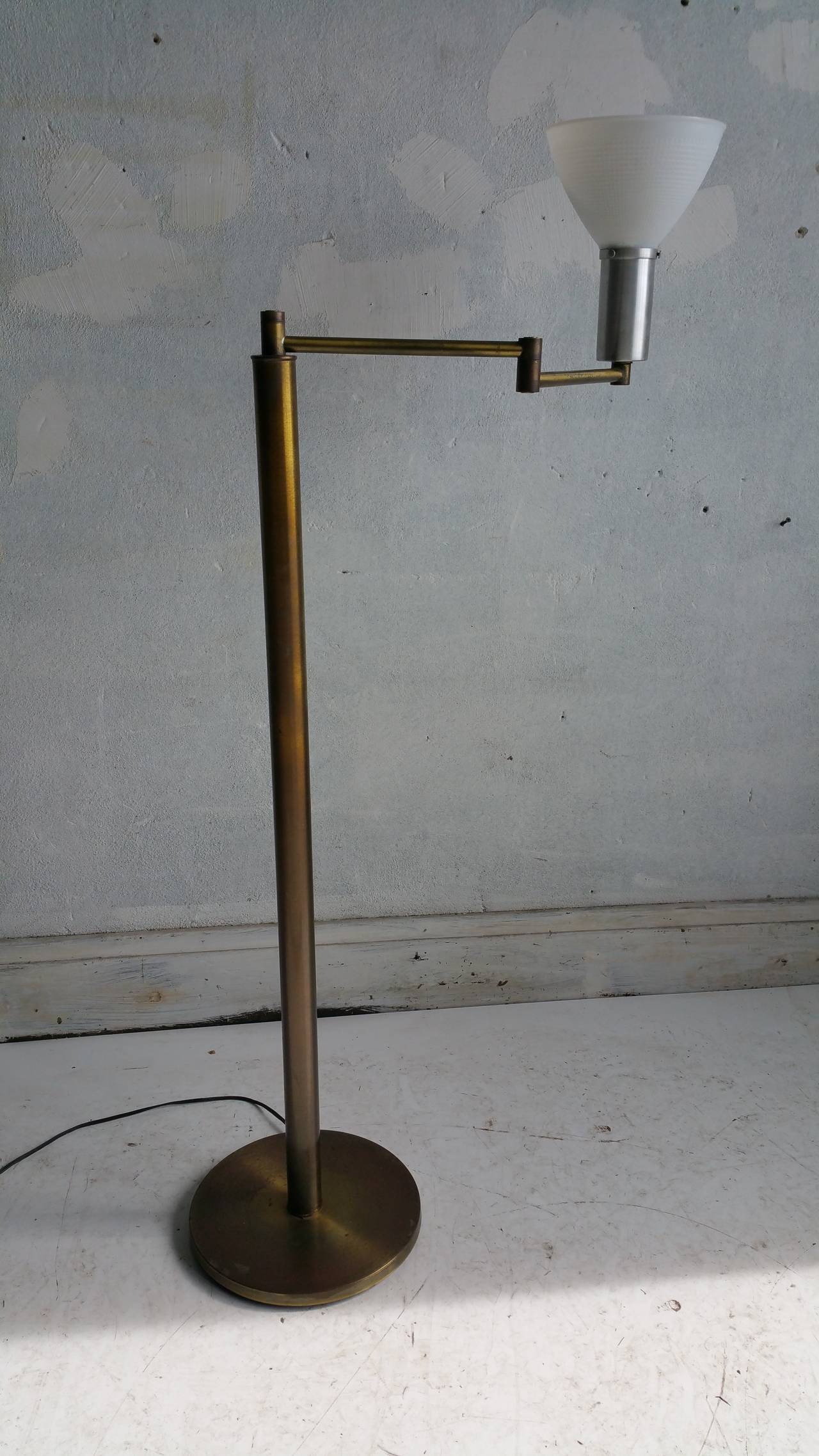 Rare and important,,,,,very early 1930s Classic Swing-arm Lamp designed by Walter Von nessen,,,made in New York City,at Nessen Studios .note the unusual pivot mechanism ,Drop down second arm design,,also the use of mixed metals,,,,,,,,,,,,,,        