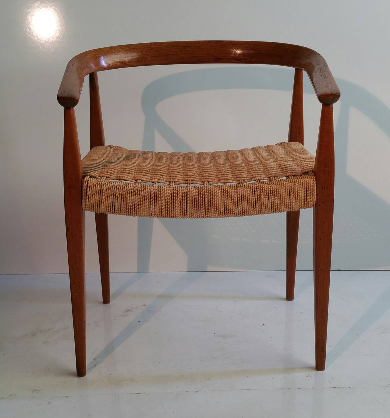 Teak and cane chair by Nanna Ditzel. Made by Kolds Savvaerk, strong design and very early example of her work.