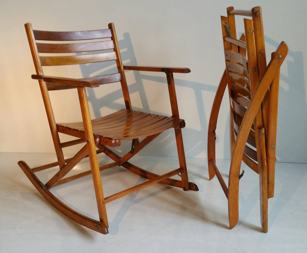 Pair Of Modernist Folding Slatted Rocking Chairs By Telescope