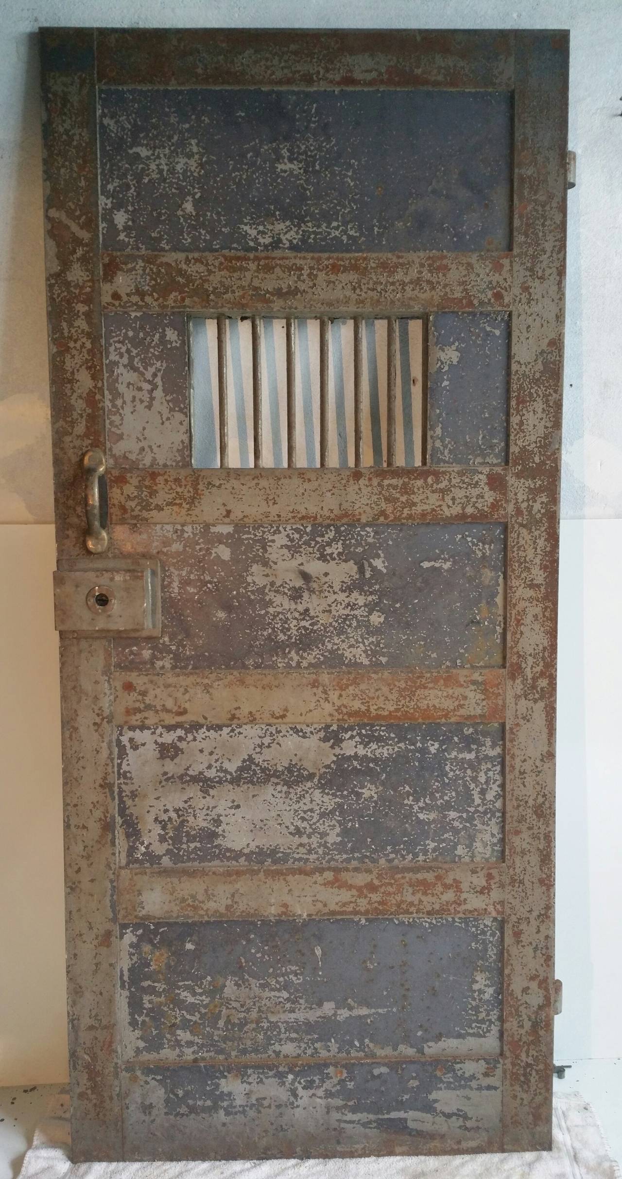 Unusual turn of the century solid three ply steel prison door, salvaged from old Downtown Buffalo New York 