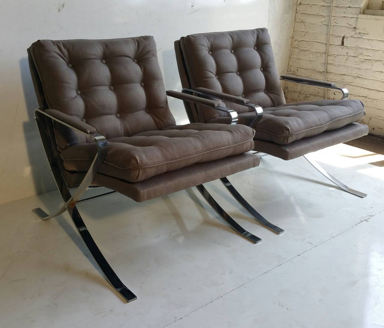 Elegant Bernhardt chrome lounge chair Inspired by the chair designs of Milo Baughman and Mies Van der Rohe's (Barcelona Chair)  
Newly reupholstered,,
The Chrome frame is in nice vintage condition.

Chairs were made by the Flair Division of the