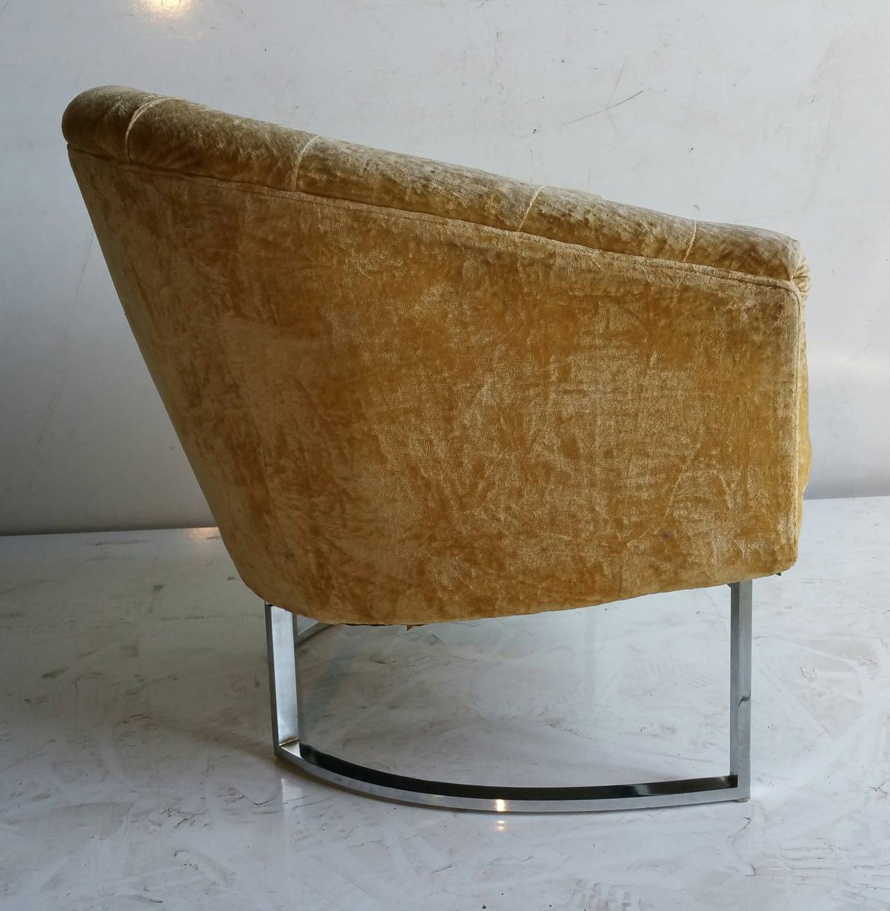 Classic Modernist Barrel chair,Designed by Milo Baughman,, Original tufted cut cotton fabric..Chromed steel base