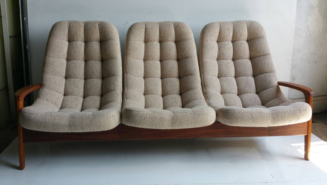Vintage teak floating egg sofa by R. Huber & Co. Extremely comfortable, solid teakwood frame, original, (period) 1960s fabric. Please see other listing for matching chair.
