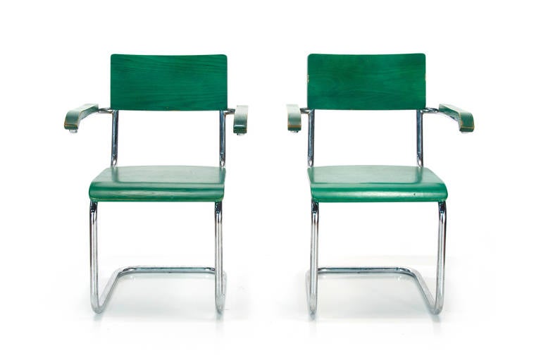 Pair of Cesca chairs designed by Marcel Breuer made in Germany. Retailed by Knoll. Custom order, green aniline dye finish. Wonderful color and patina.