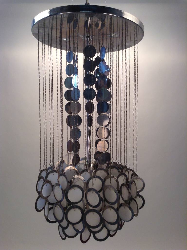 Stunning modernist pendant chandelier in glass and chrome.
