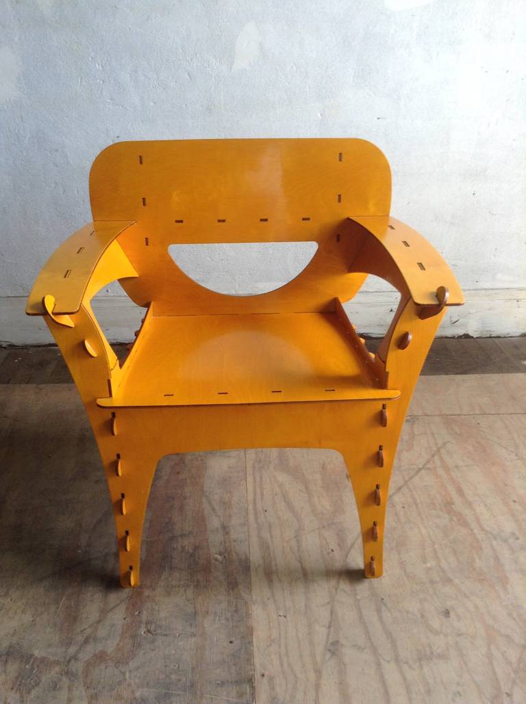 Puzzle chair designed by David Kawecki, San Francisco, circa 1991. Makes a wonderful stand alone chair that fits seamlessly into any decor. Innovative, whimsical design. Birch plywood puzzle pieces,