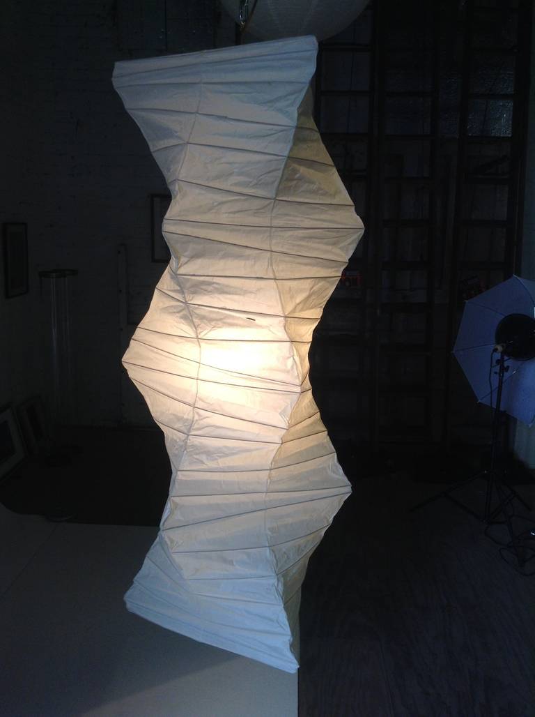 Light sculptures by Isamu Noguchi are considered icons of the 1950s modern design. Designed by Noguchi beginning in 1951 and handmade for half a century by the original manufacturer in Gifu ,Japan, the paper lanterns are a harmonious blend of