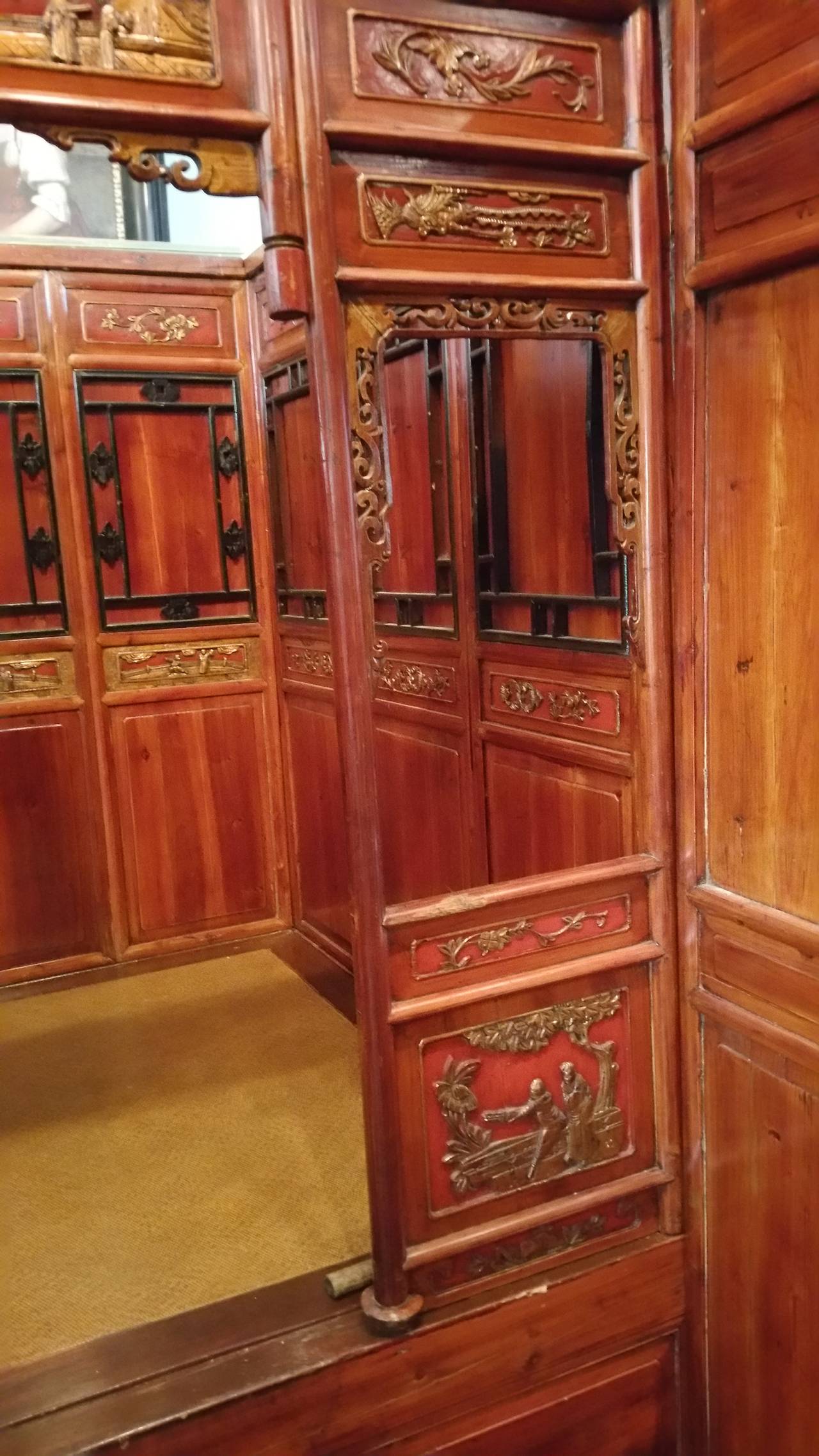 Mid to late 19th century, elaborately carved, antique Chinese bed Chambers was used to greet visitors and usually was furnished with two chairs and a center table: from which tea, wine and food were served.
The front alcove section of the bed