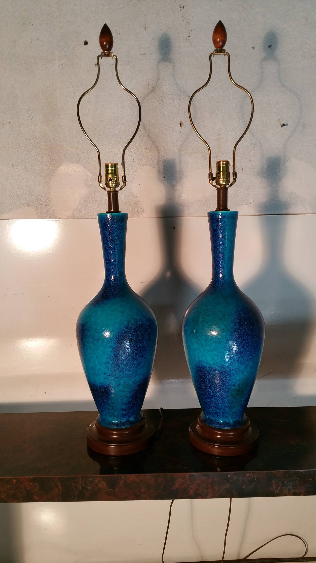 Beautiful large scale pottery lamps,, I believe these to be French,,possibly German. Retain original textile and match-stick lamp shades designed by Maria Kipp,,,Shades measure 21