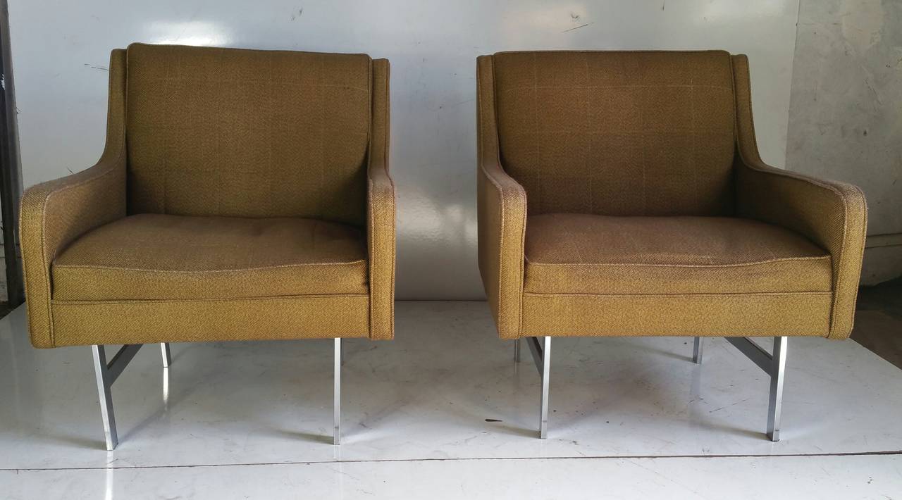 Matched pair of modernist lounge chairs,,Classic design,,chromed steel 