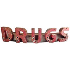 Monumentales:: neonfarbenes "Drugs"-Ladenschild