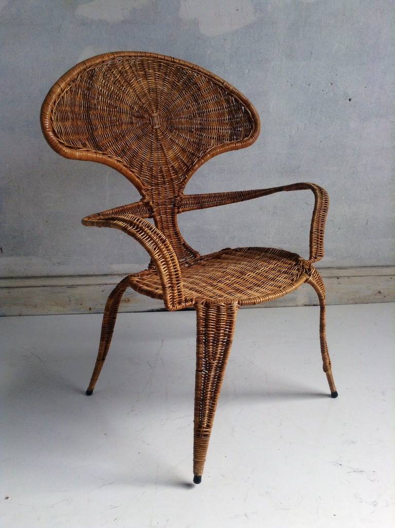 Unusual Wicker Wrapped Arm Chair, Bug-like design,Extremely comfortable,, Great accent piece,,,Manner of Lavern