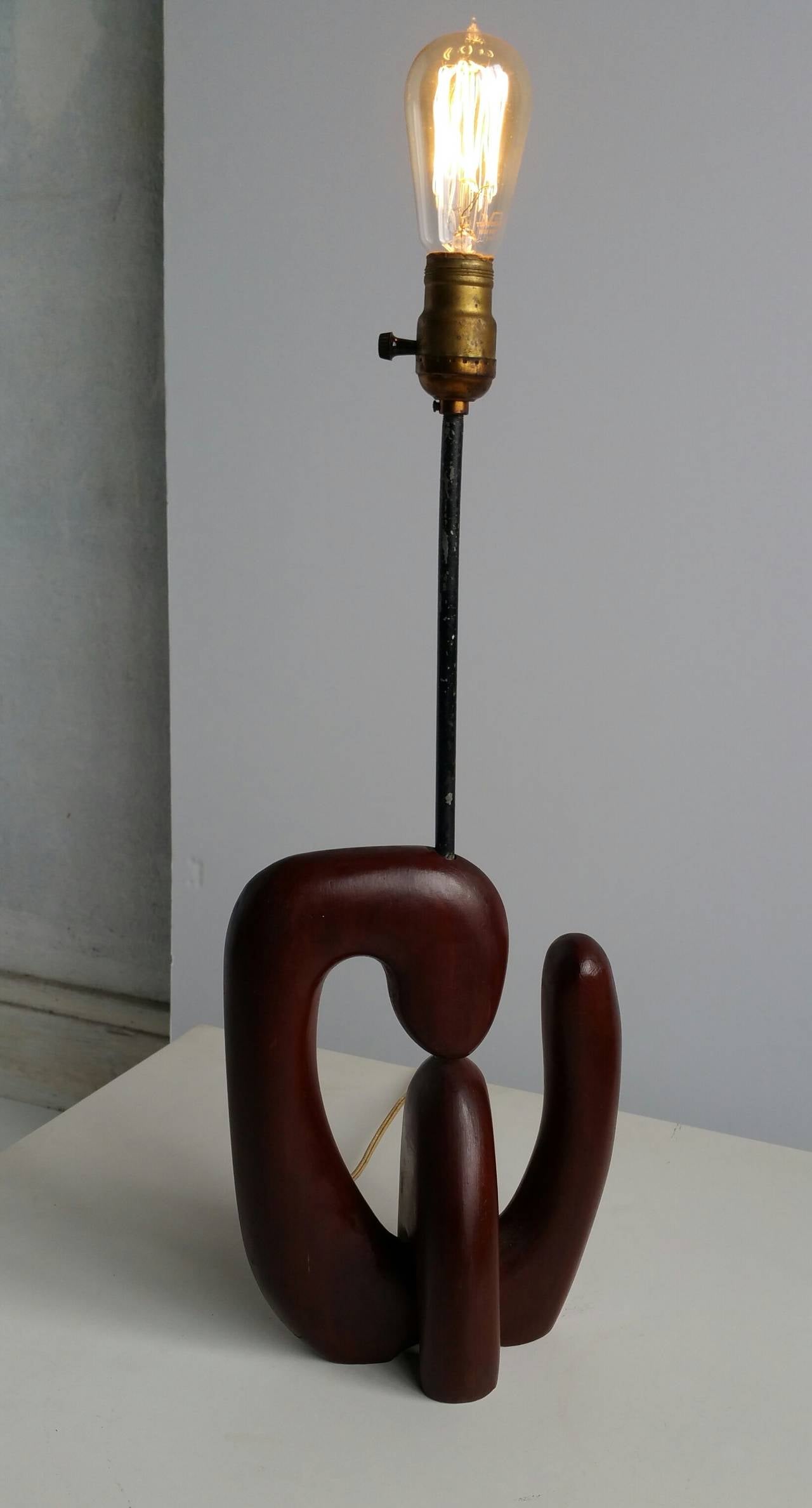 1950s Period Sculptural wood and brass table lamp.. Reminiscent of the Classic Modern forms by Noguchi,Henry Moore