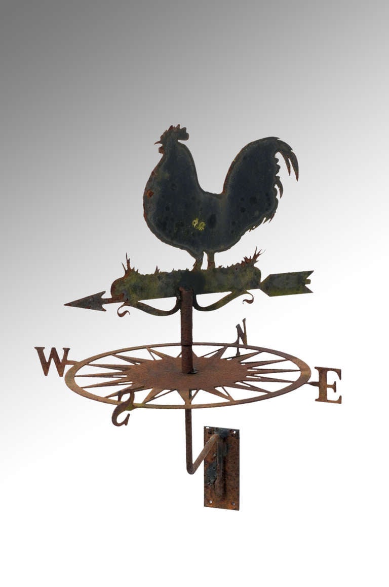 This Cockerel Weathervane has some charming and practical features not least that it is wall mounting (so perfect for screwing against a beam). Also incorporated in this antique weathervane design is a compass-sunburst-dial. So no matter what the