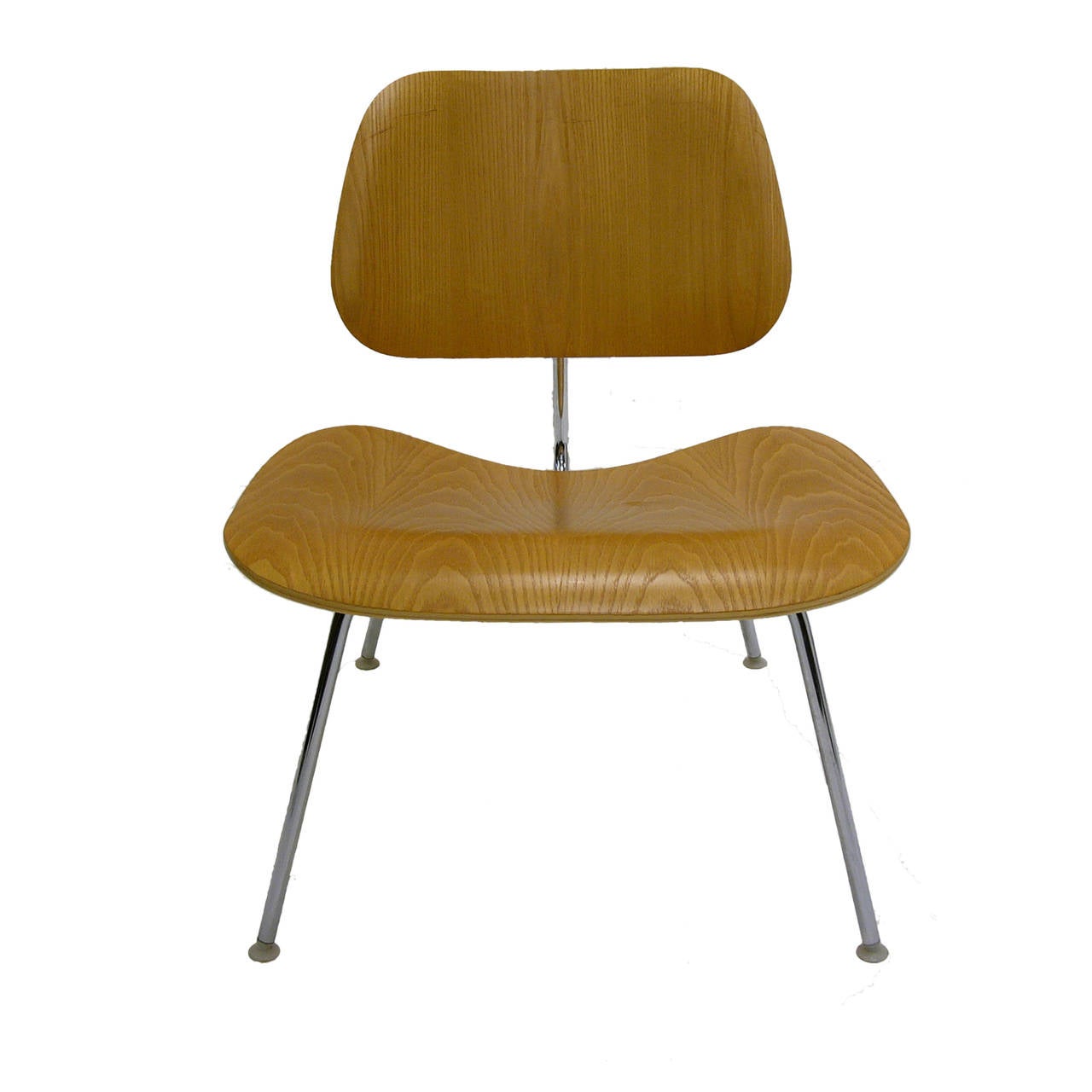 A pair of Charles Eames for Herman Miller LCM lounge chairs in ash.