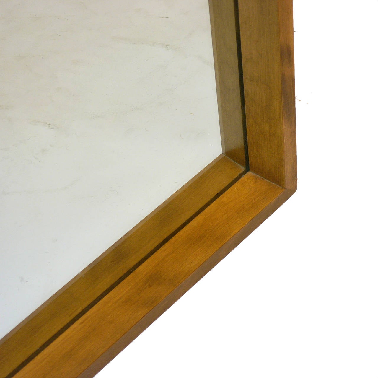 A very nice angled maple mirror by Russel Wright for Conant Ball.