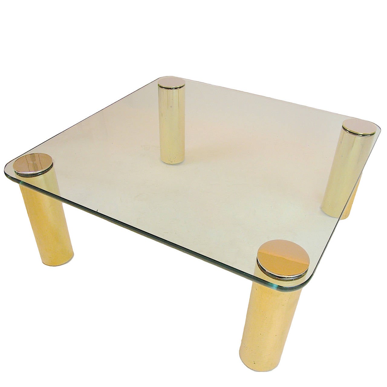 Pace glass top coffee table with 5 inch cylinder legs.