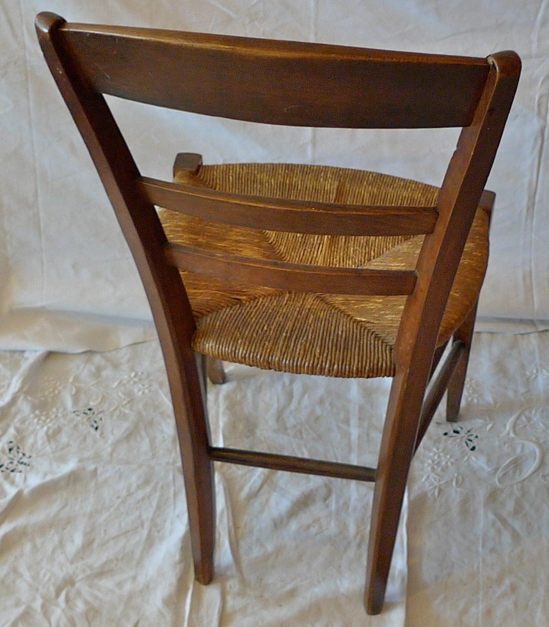 French 19th Century Country Ladder Back Side Chair With Rush Seat. 1