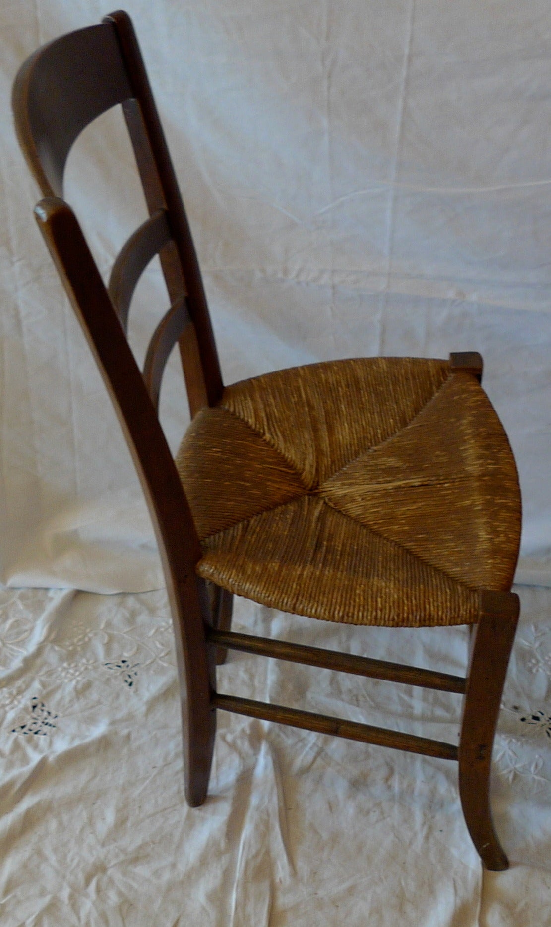 Late 19th Century French 19th Century Country Ladder Back Side Chair With Rush Seat.