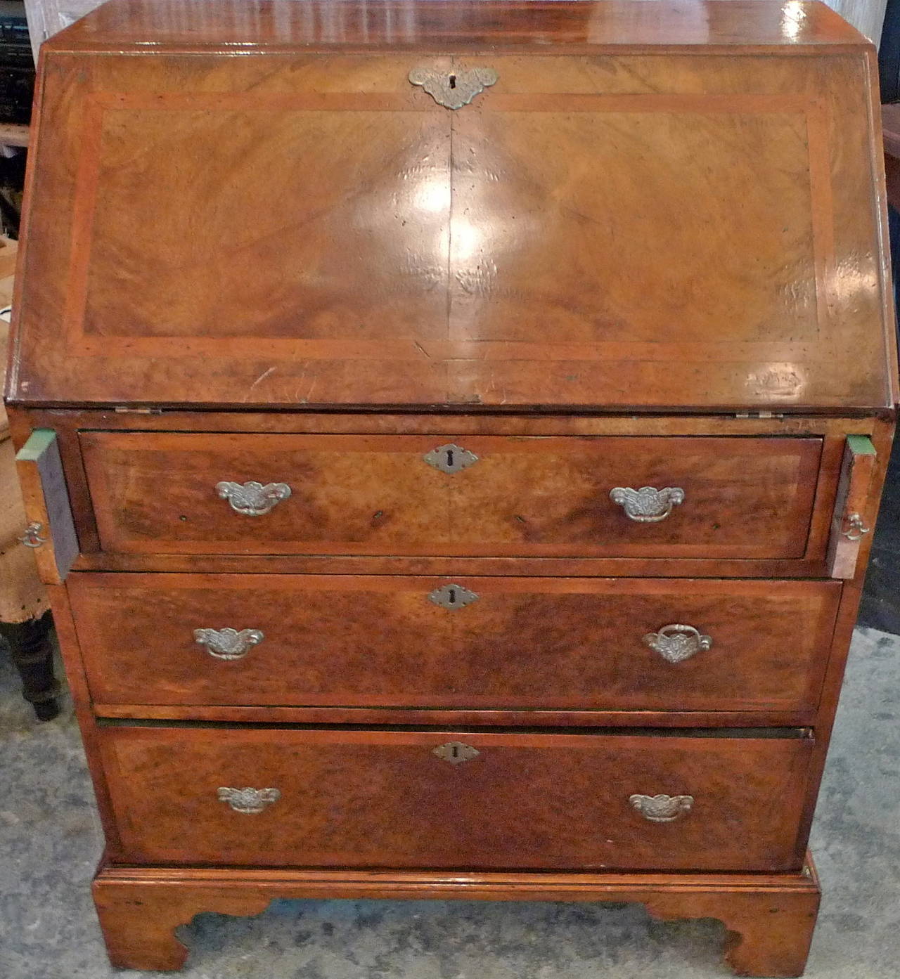 English 19th century secretaires desk with three outer and three inner drawers and seven inner postal compartments. All original bronze hardware.