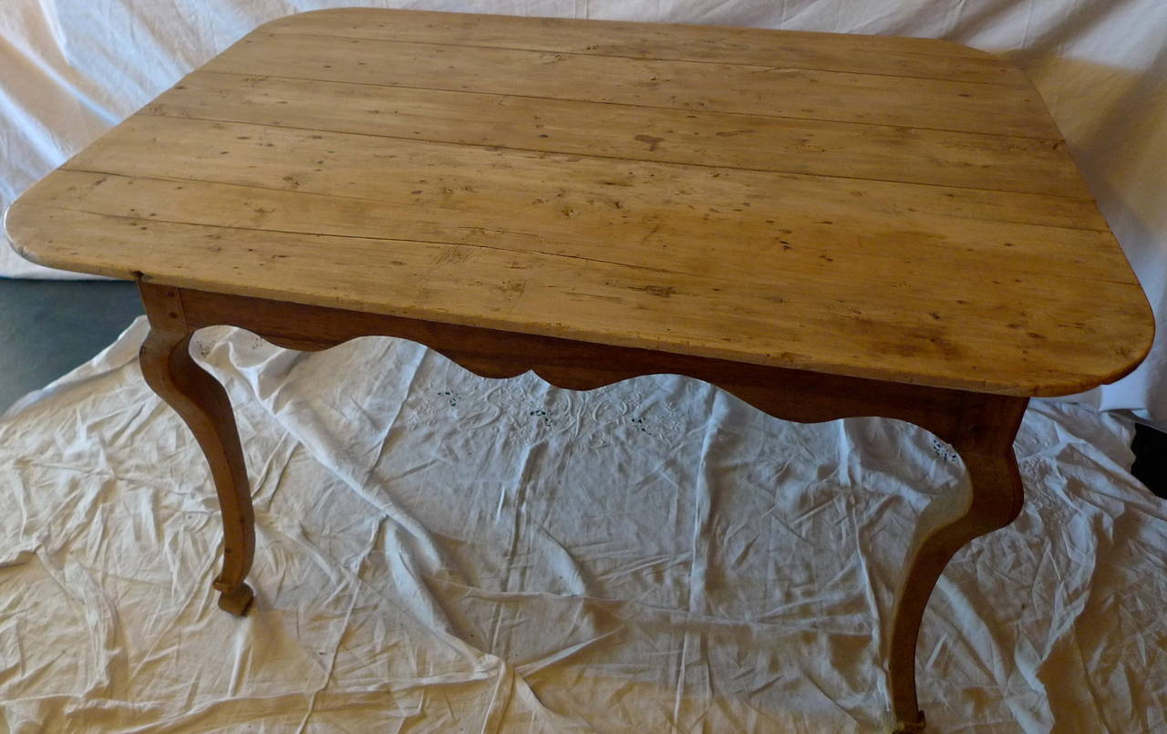 French xviii Louis XV Provençe fruitwood entry table with one end drawer.