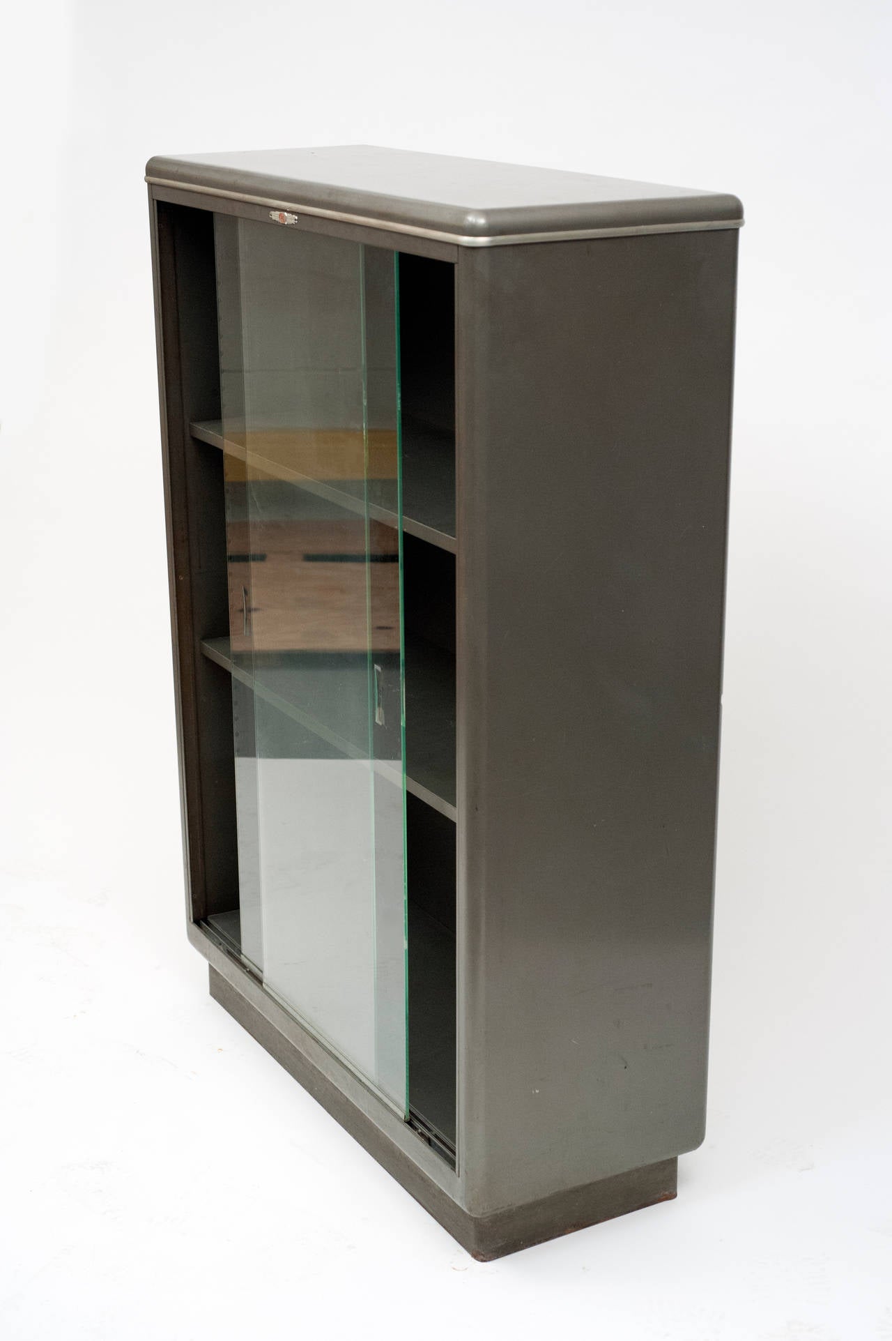 Glass Vintage Industrial Streamlined Metal Bookcase by Yawman and Erbe
