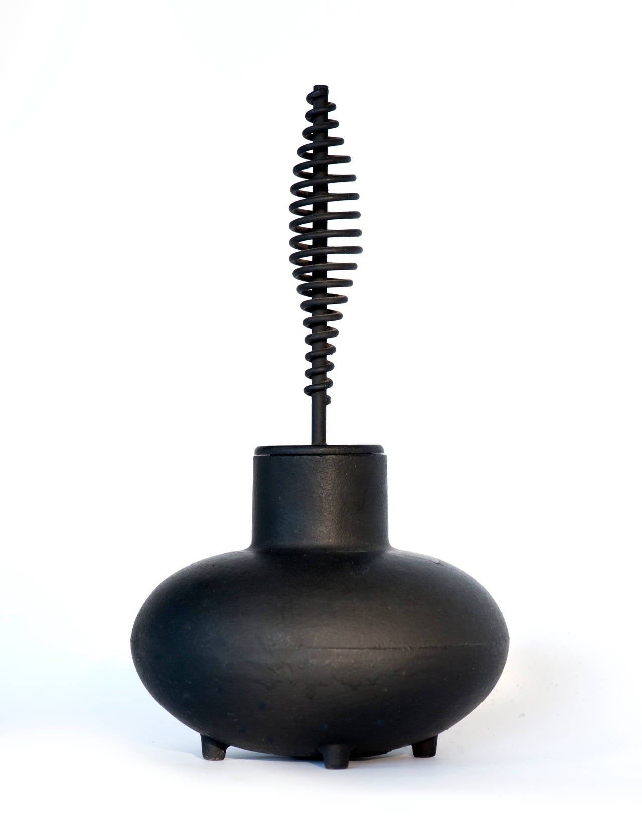 Excellent example of George Nelson designed firestarter.  Made of cast iron by Howard Miller of Zeeland, Michigan. 