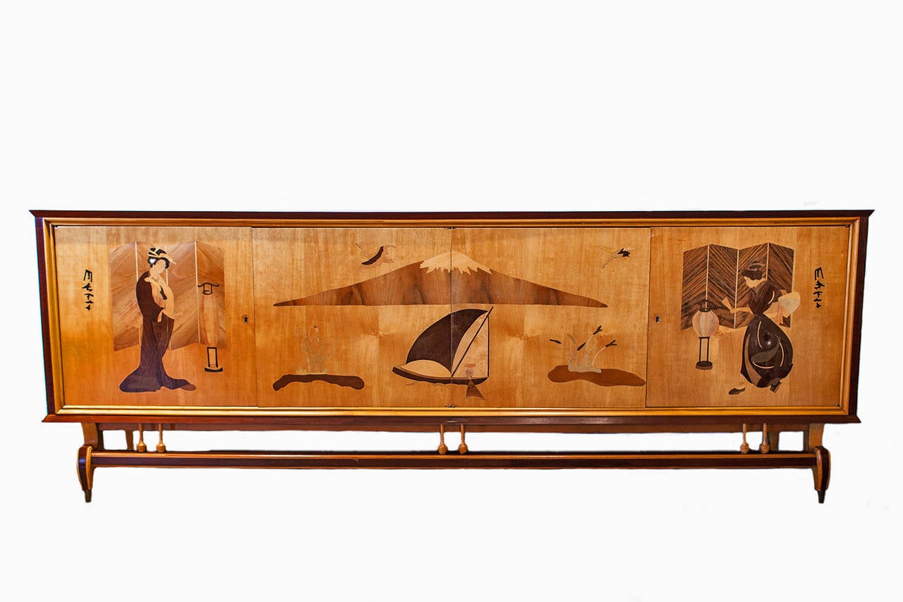 This glamorous vintage modern Italian sideboard with its intricate inlaid wood by using the painstaking artisan method of marquetry depicting a gentile Asian theme, transports you back in time to your own “Roman Holiday”! The interior reveals ample