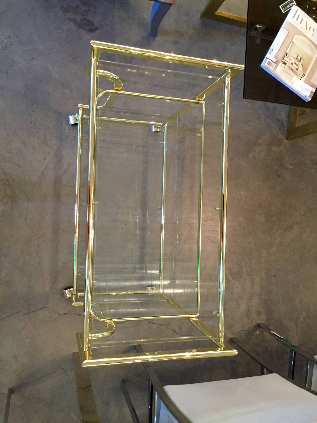 Hollywood Regency Three-Tier Glass and Gold Tone Metal Bar Cart In Excellent Condition In Houston, TX