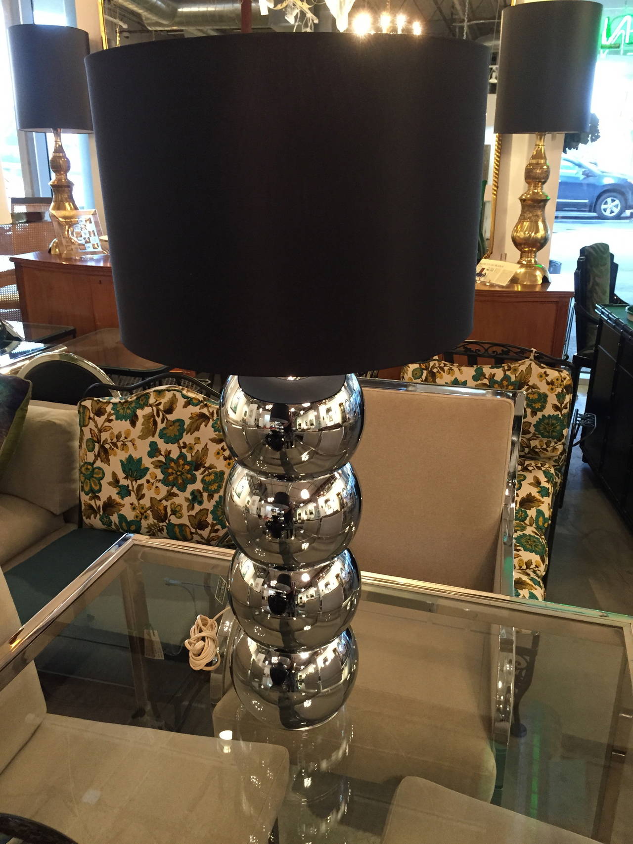 George Kovacs was known for adding humor with great utility to his iconic Mid-Century Modern table lamps designs. Offered is a pair of chrome 