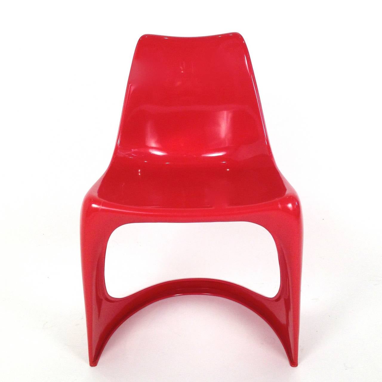 Vintage Danish cherry red molded plastic chairs in the manner of Verner Panton.