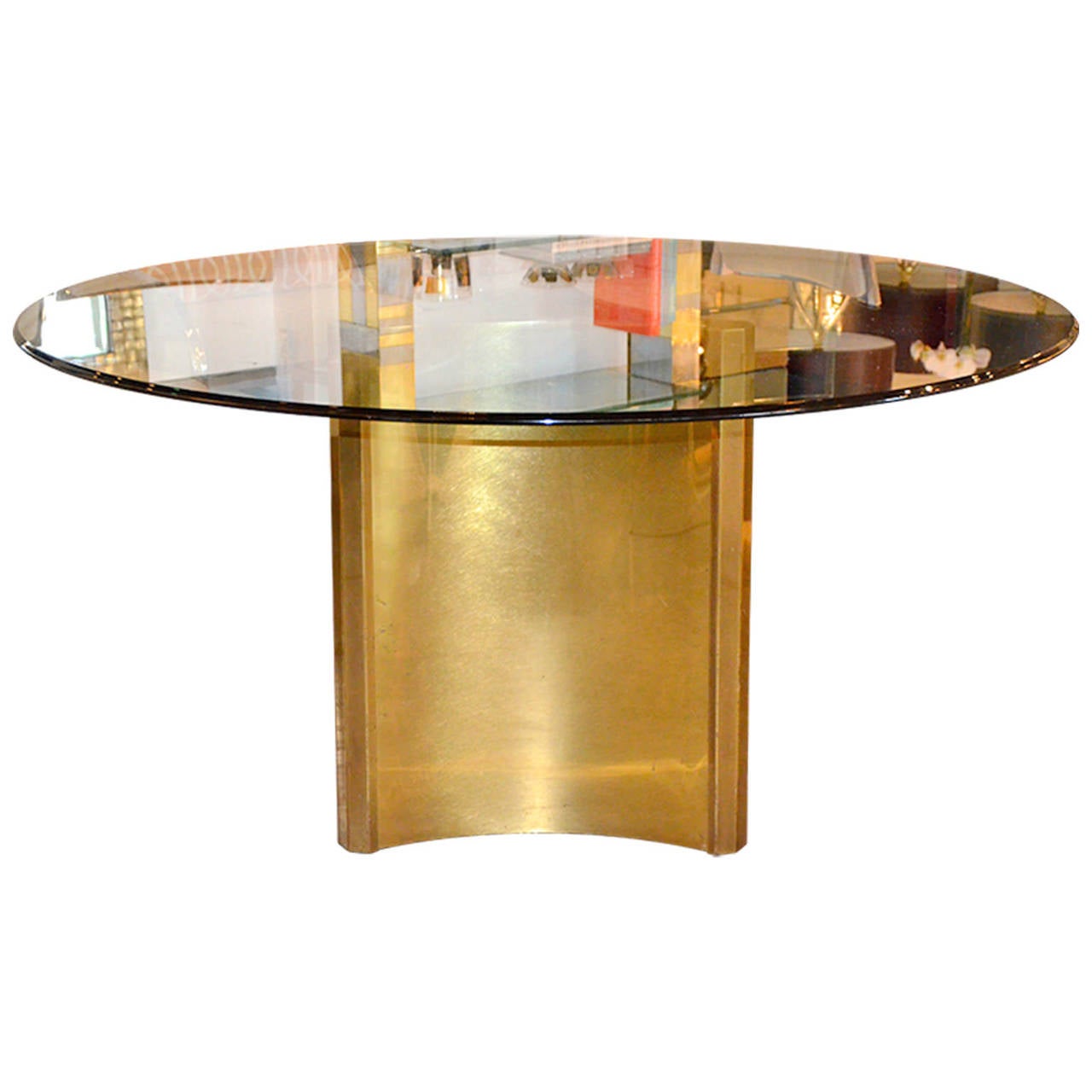 An iconic brass table base by an iconic brass furniture manufacturer, Mastercraft. The Mastercraft brass tri-fold base is quite rare and hard to find. Top with glass, stone or any top of your choice.