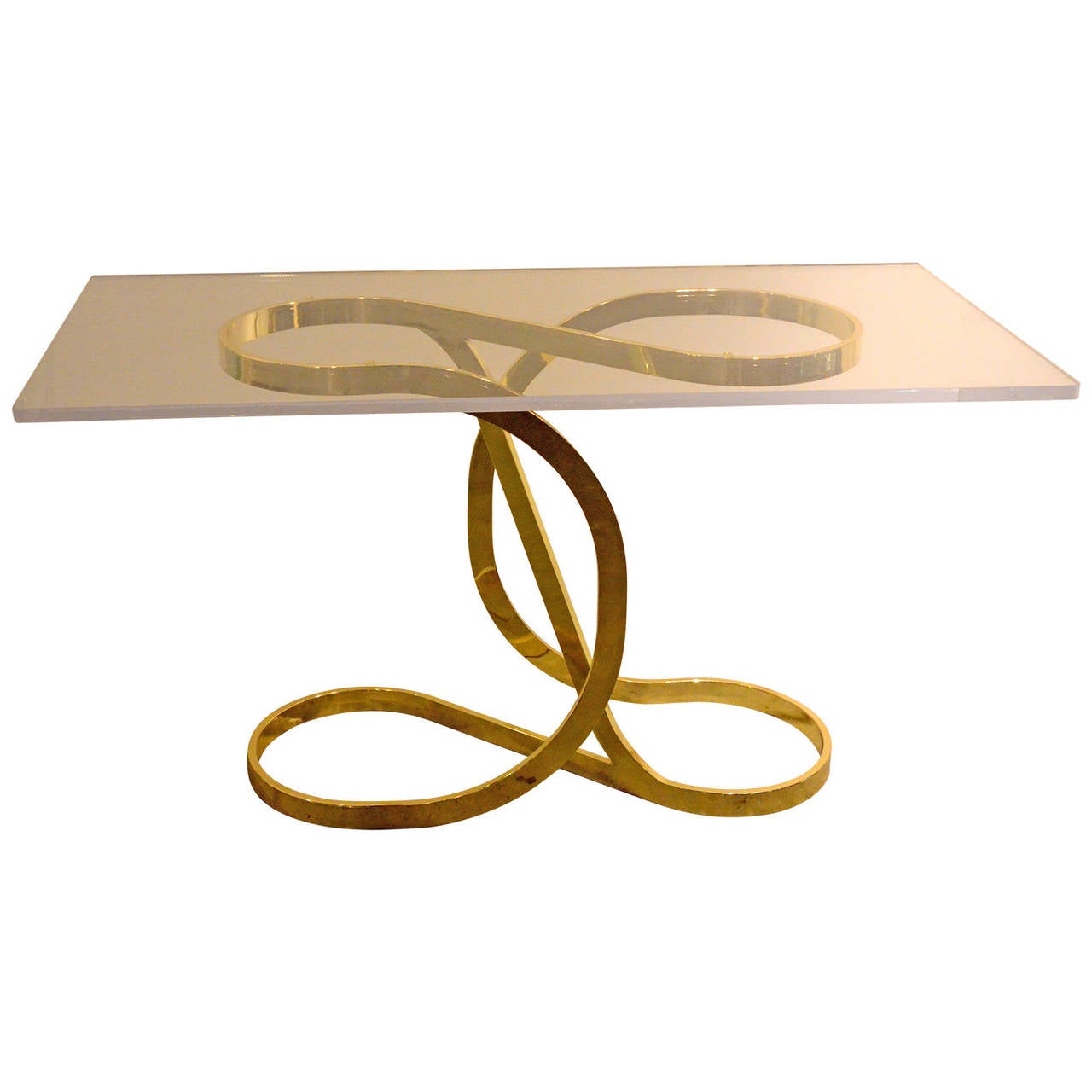 Offered is a brass ribbon console base by Milo Baughman.  We have added the cool Lucite top for a fresh new take on 70s & 80s' classic modernism.