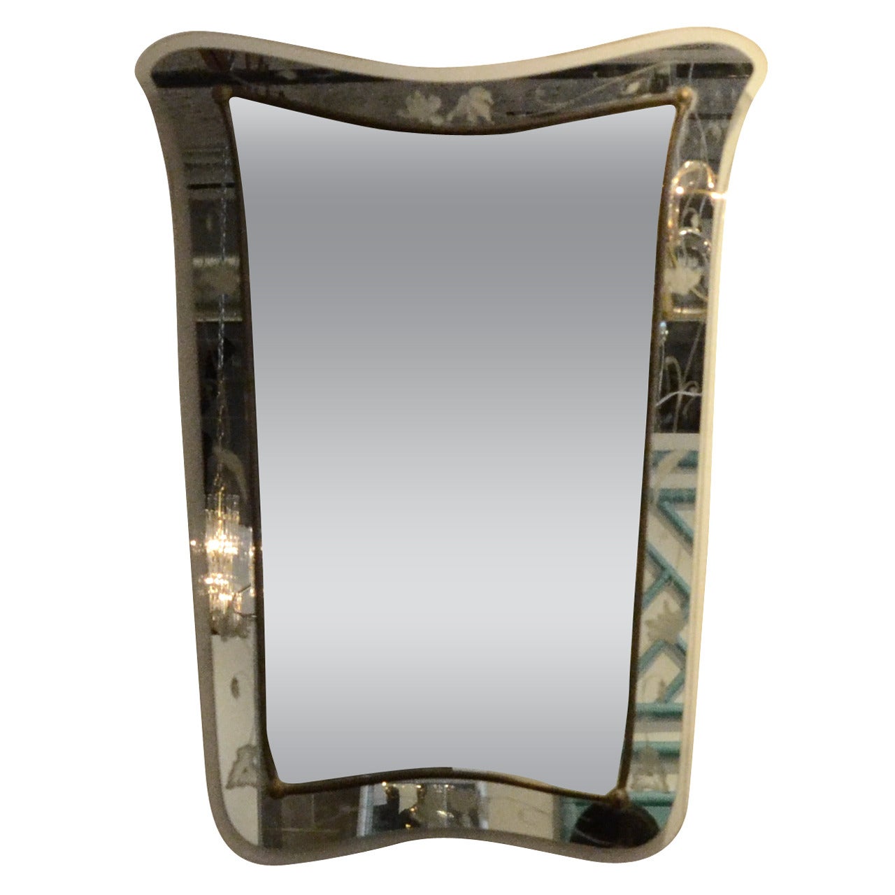 Offered is a Mid-Century Modern Italian Pietra Cheisa Fontana Arte style etched glass mirror. This vintage Italian Mid-Century Modern Venetian etched glass decorative mirror is a lovely example of timeless Italian craftsmanship that is rich in