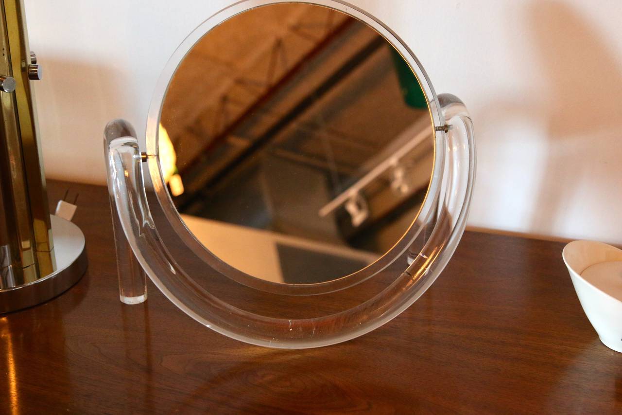 Offered is a vintage Lucite tabletop make-up mirror by Dorothy Thorpe.  The lines on this piece are so retro and fabulous.  Would look gorgeous on a dressing table.