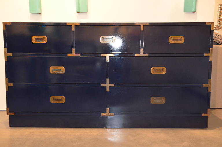 We love vintage 1970s Campaign furniture! This fabulous dresser is newly lacquered in a steely navy blue with polished brass hardware. This timeless piece would look fabulous in a “Hollywood Glam” or a “Mad Man” (or boy) bedroom or dressing room and