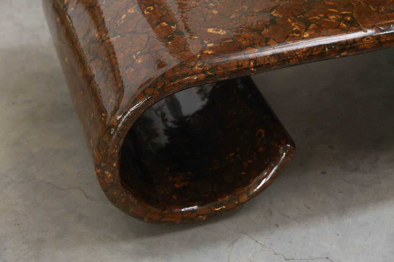 Offered is a mid century modern “scroll
