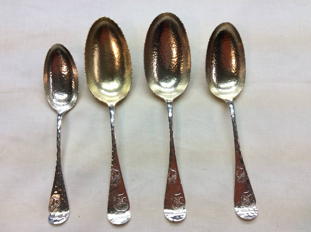 Aesthetic/ Medallion patent Sterling Sliver Serving Spoons retaining original gold wash to bowl. Circa 1880
In the 'antique' style, each hammer-faceted with profile masks on handle.
From the collection of Sam Wagstaff of Collection of American