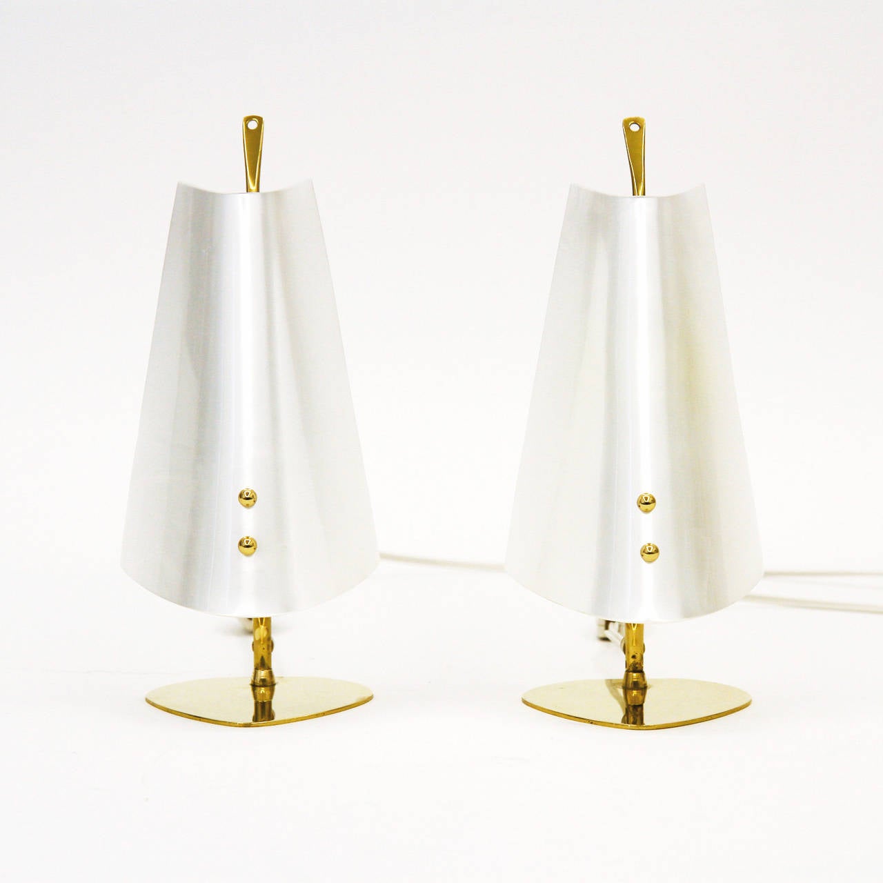 Lovely pair of table or bedside lamps in brass with mother-of-pearl perspex shades. Terrific stylish mood lights in very good original condition. One candelabra size E14 bulb per lamp.